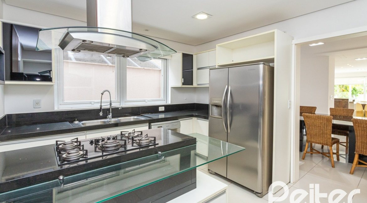 Casa em Condomínio à venda com 463m², 4 dormitórios, 4 suítes, 3 vagas, no bairro Terra Ville em PORTO ALEGRE