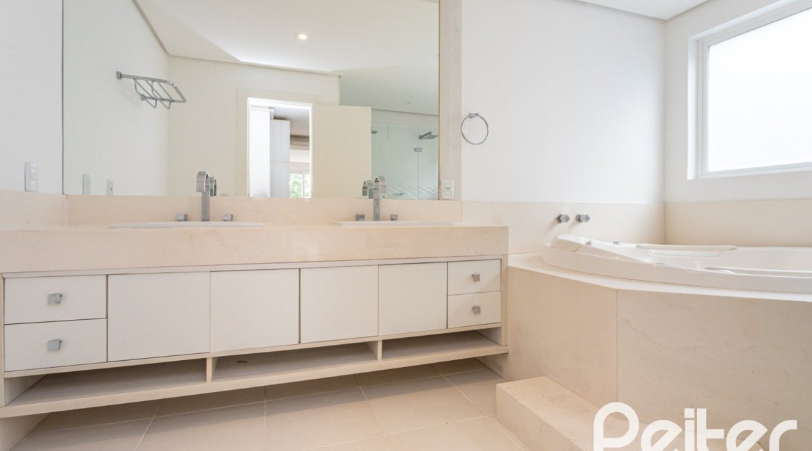 Casa em Condomínio à venda com 463m², 4 dormitórios, 4 suítes, 3 vagas, no bairro Terra Ville em PORTO ALEGRE