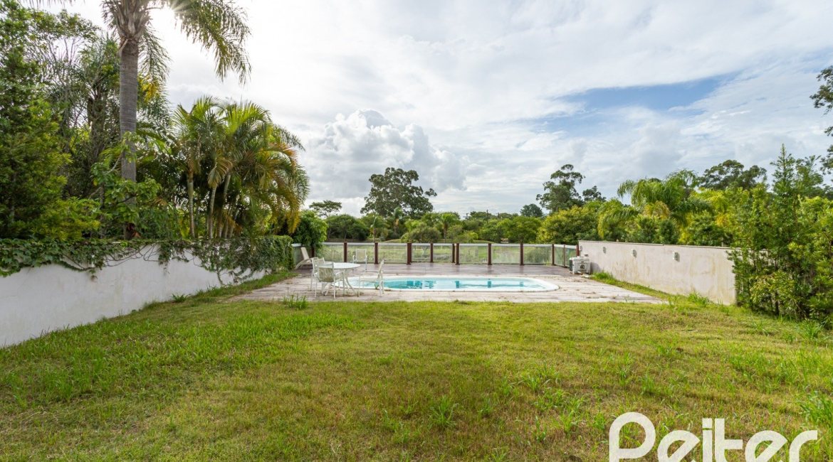 Casa em Condomínio à venda com 463m², 4 dormitórios, 4 suítes, 3 vagas, no bairro Terra Ville em PORTO ALEGRE