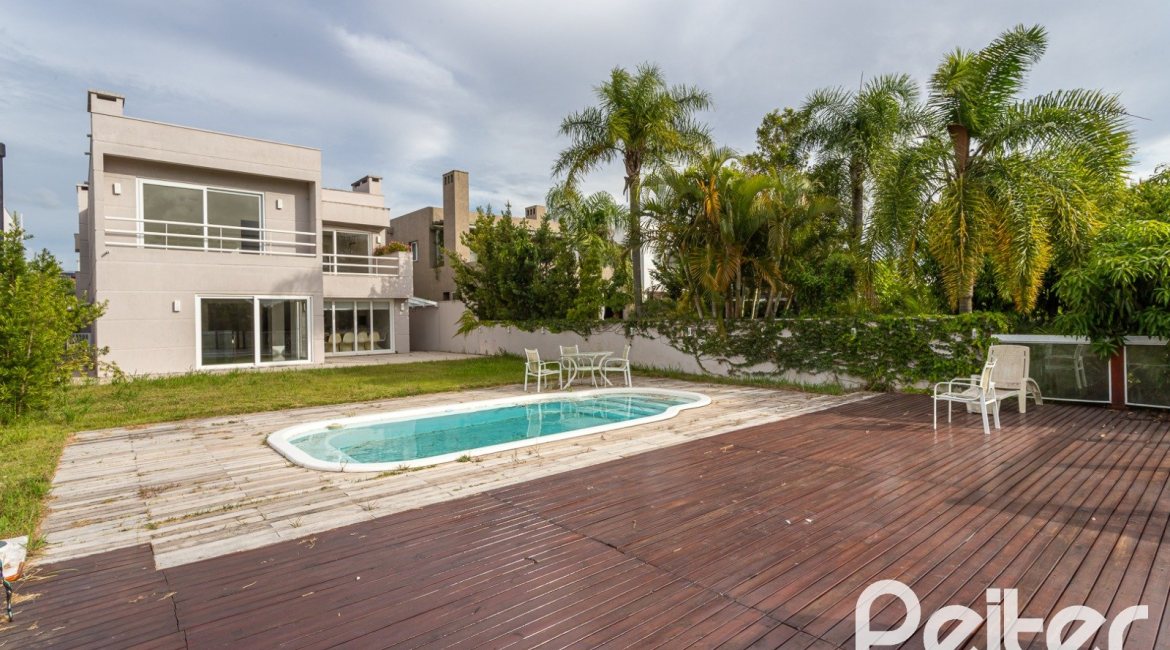 Casa em Condomínio à venda com 463m², 4 dormitórios, 4 suítes, 3 vagas, no bairro Terra Ville em PORTO ALEGRE
