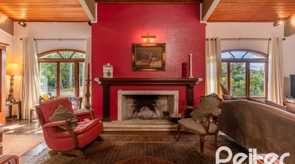 Casa em Condomínio à venda com 565m², 5 dormitórios, 3 suítes, 4 vagas, no bairro Cavalhada em Porto Alegre