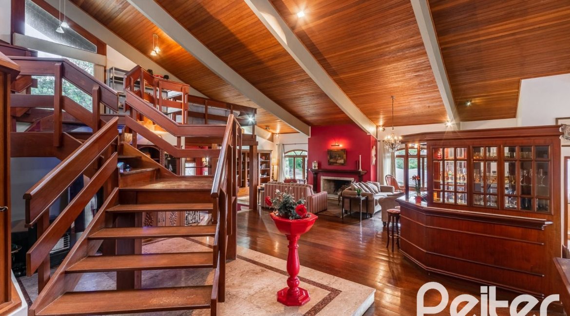 Casa em Condomínio à venda com 565m², 5 dormitórios, 3 suítes, 4 vagas, no bairro Cavalhada em Porto Alegre