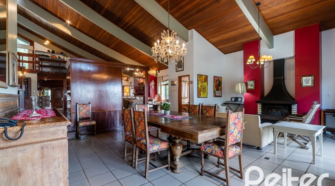 Casa em Condomínio à venda com 565m², 5 dormitórios, 3 suítes, 4 vagas, no bairro Cavalhada em Porto Alegre