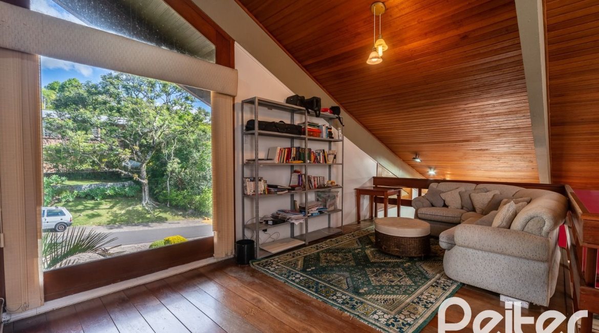 Casa em Condomínio à venda com 565m², 5 dormitórios, 3 suítes, 4 vagas, no bairro Cavalhada em Porto Alegre