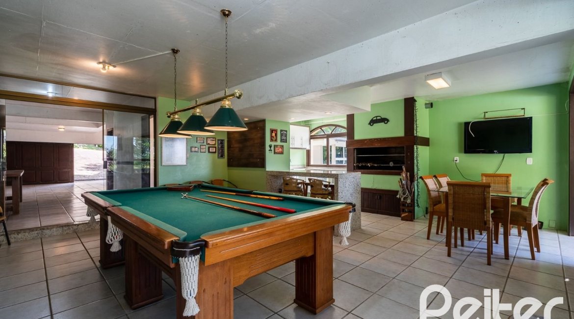 Casa em Condomínio à venda com 565m², 5 dormitórios, 3 suítes, 4 vagas, no bairro Cavalhada em Porto Alegre