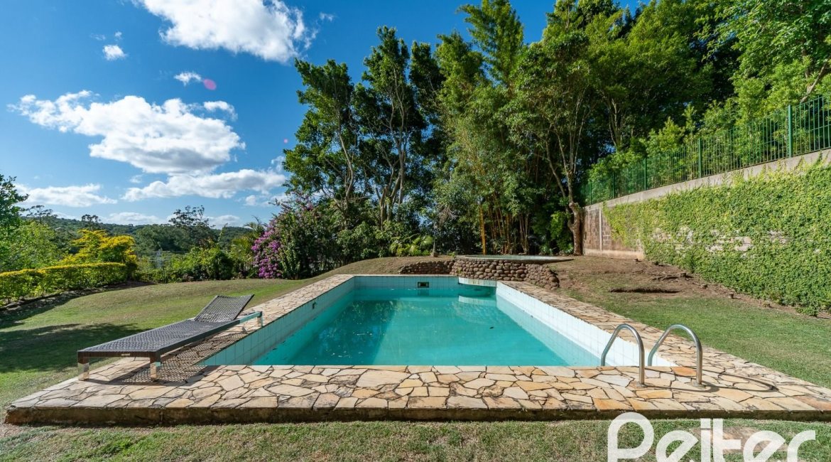 Casa em Condomínio à venda com 565m², 5 dormitórios, 3 suítes, 4 vagas, no bairro Cavalhada em Porto Alegre