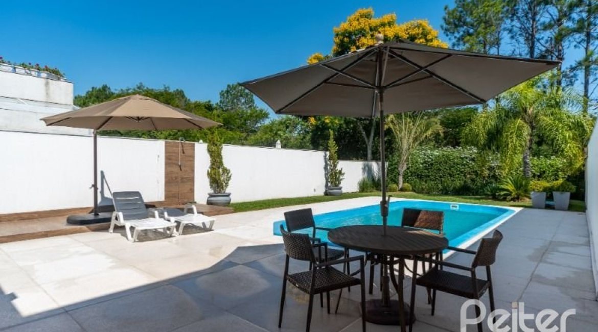 Casa em Condomínio à venda com 239m², 4 dormitórios, 4 suítes, 4 vagas, no bairro Terra Ville em Porto Alegre