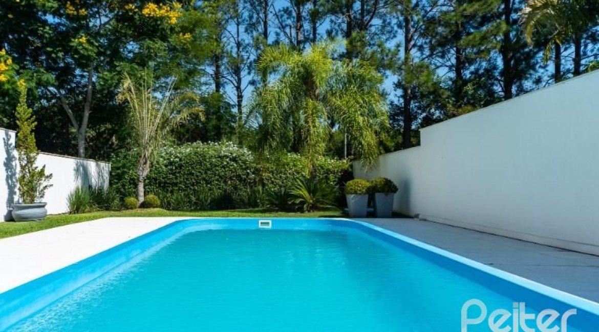 Casa em Condomínio à venda com 239m², 4 dormitórios, 4 suítes, 4 vagas, no bairro Terra Ville em Porto Alegre