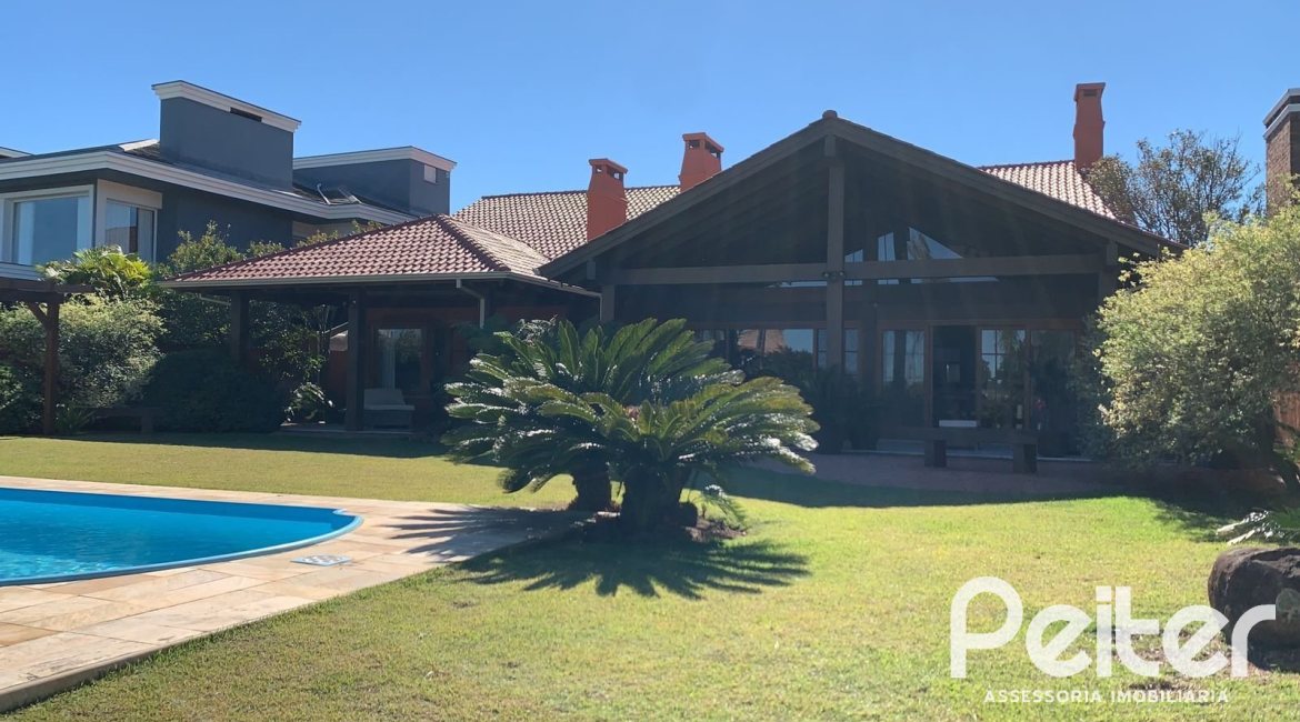 Casa em Condomínio à venda com 596m², 4 dormitórios, 4 suítes, 4 vagas, no bairro Terra Ville em PORTO ALEGRE