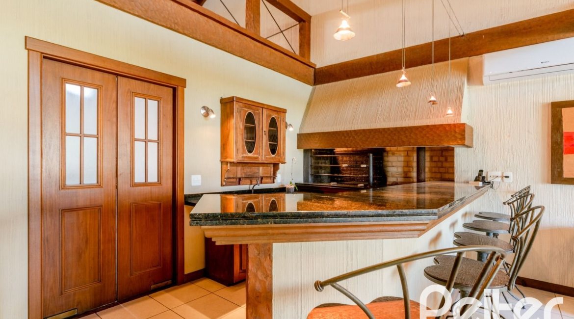 Casa em Condomínio à venda com 596m², 4 dormitórios, 4 suítes, 4 vagas, no bairro Terra Ville em PORTO ALEGRE