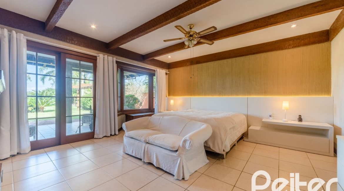 Casa em Condomínio à venda com 596m², 4 dormitórios, 4 suítes, 4 vagas, no bairro Terra Ville em PORTO ALEGRE