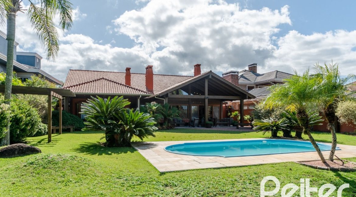 Casa em Condomínio à venda com 596m², 4 dormitórios, 4 suítes, 4 vagas, no bairro Terra Ville em PORTO ALEGRE