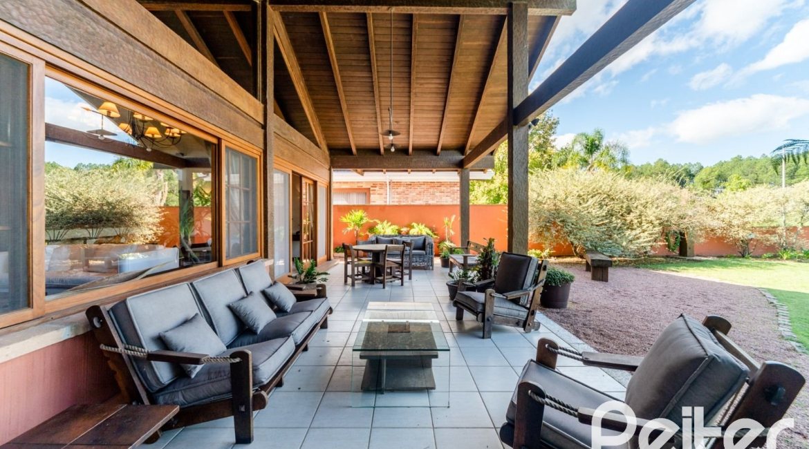 Casa em Condomínio à venda com 596m², 4 dormitórios, 4 suítes, 4 vagas, no bairro Terra Ville em PORTO ALEGRE