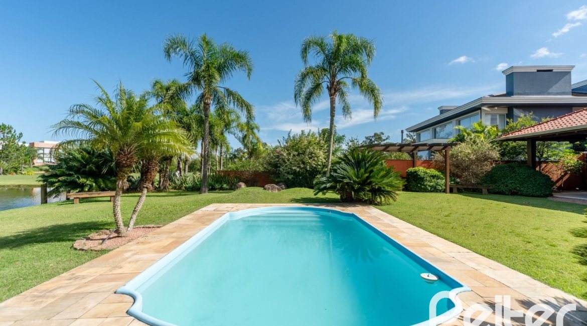 Casa em Condomínio à venda com 596m², 4 dormitórios, 4 suítes, 4 vagas, no bairro Terra Ville em PORTO ALEGRE