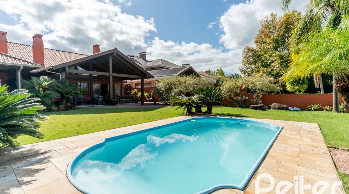 Casa em Condomínio à venda com 596m², 4 dormitórios, 4 suítes, 4 vagas, no bairro Terra Ville em PORTO ALEGRE