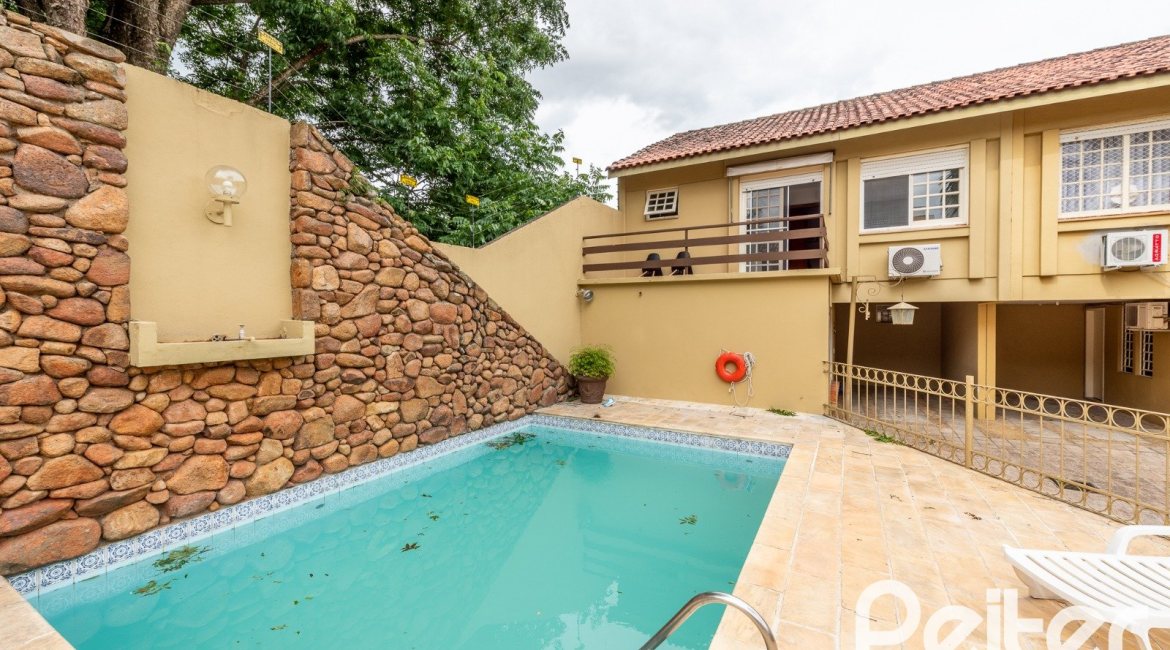 Casa em Condomínio à venda com 160m², 3 dormitórios, 1 suíte, 2 vagas, no bairro Tristeza em PORTO ALEGRE