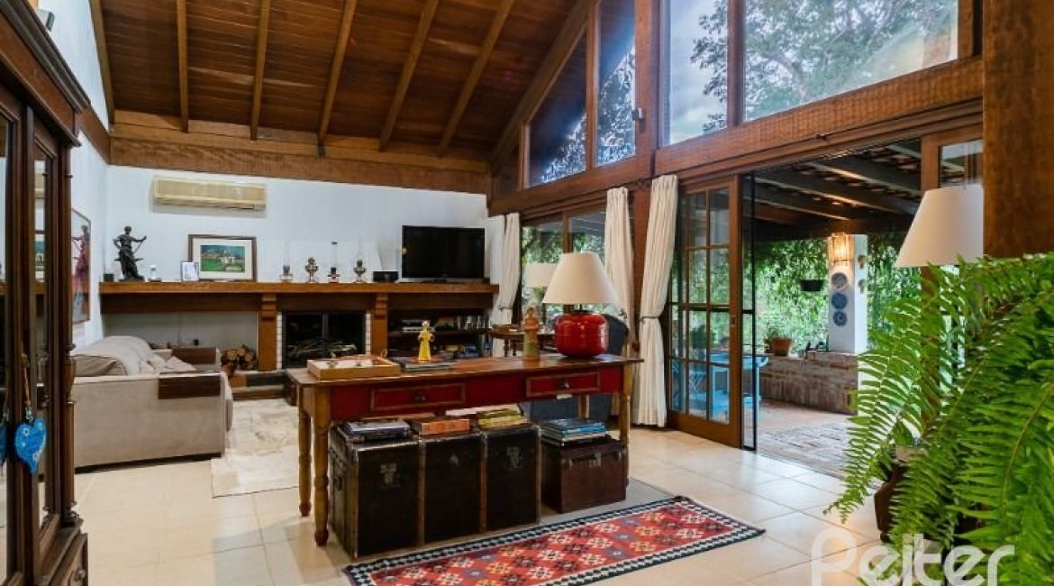 Casa em Condomínio à venda com 232m², 4 dormitórios, 1 suíte, 4 vagas, no bairro Terra Ville em PORTO ALEGRE