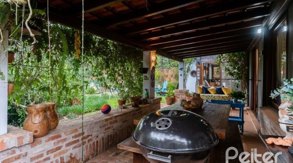 Casa em Condomínio à venda com 232m², 4 dormitórios, 1 suíte, 4 vagas, no bairro Terra Ville em PORTO ALEGRE