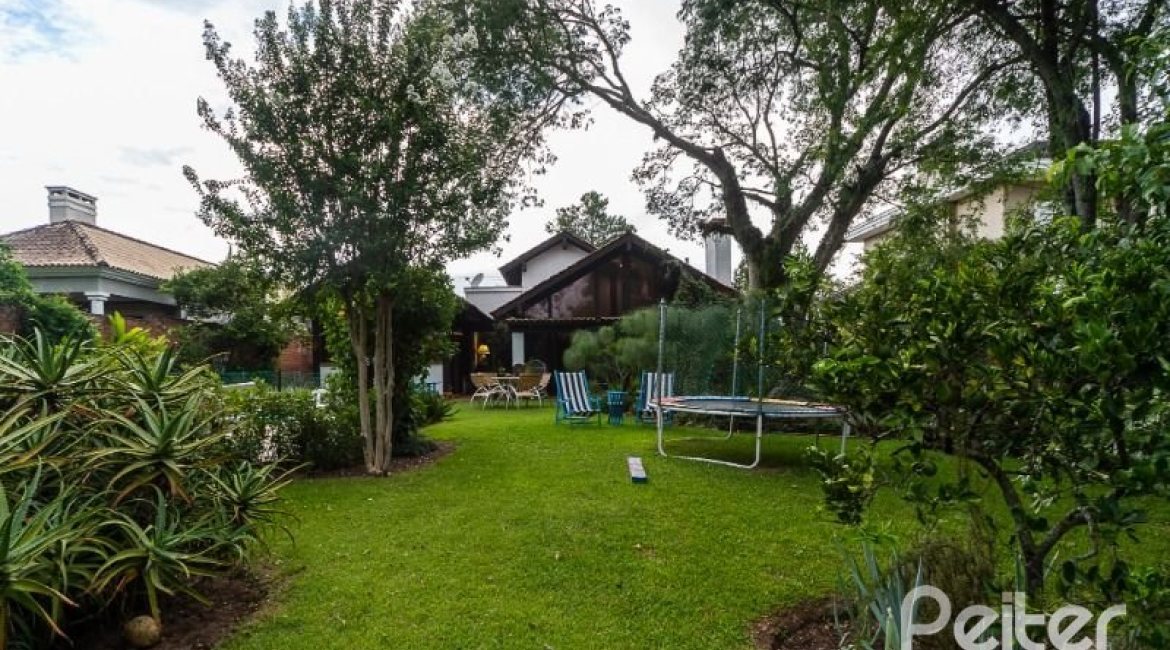 Casa em Condomínio à venda com 232m², 4 dormitórios, 1 suíte, 4 vagas, no bairro Terra Ville em PORTO ALEGRE