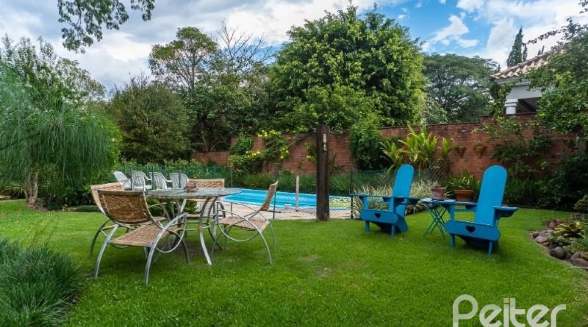 Casa em Condomínio à venda com 232m², 4 dormitórios, 1 suíte, 4 vagas, no bairro Terra Ville em PORTO ALEGRE