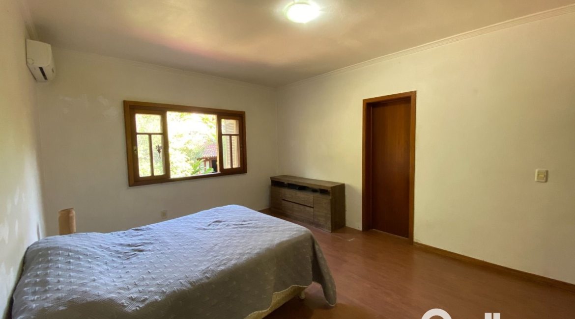 Casa à venda com 360m², 4 dormitórios, 4 suítes, 4 vagas, no bairro Tristeza em Porto Alegre