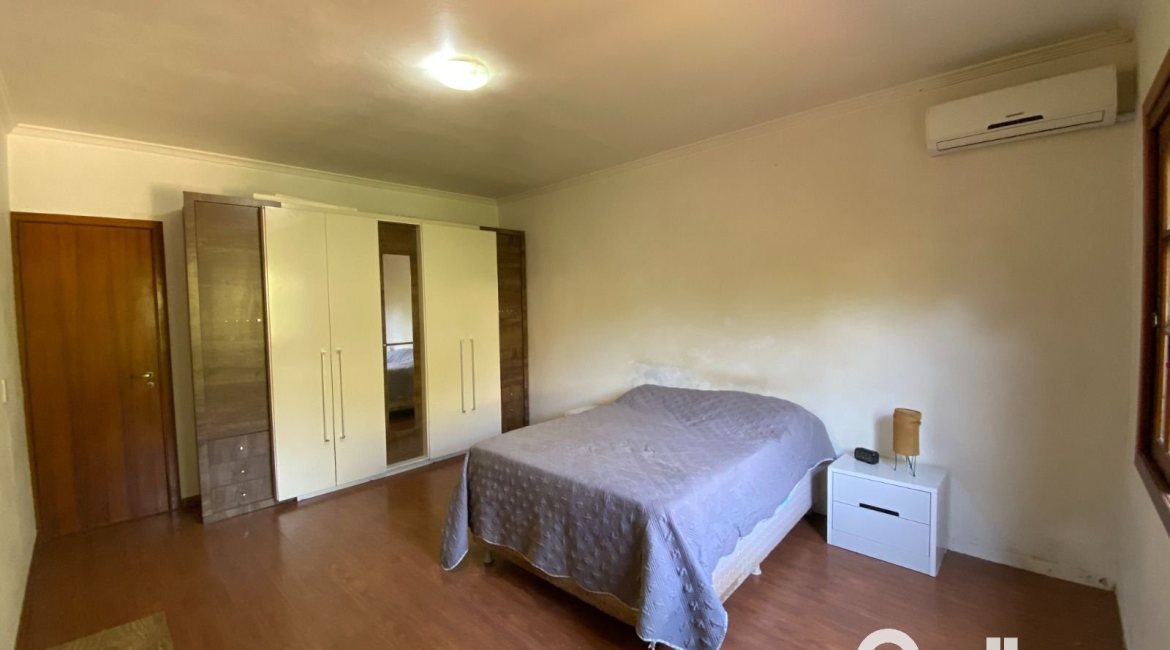 Casa à venda com 360m², 4 dormitórios, 4 suítes, 4 vagas, no bairro Tristeza em Porto Alegre