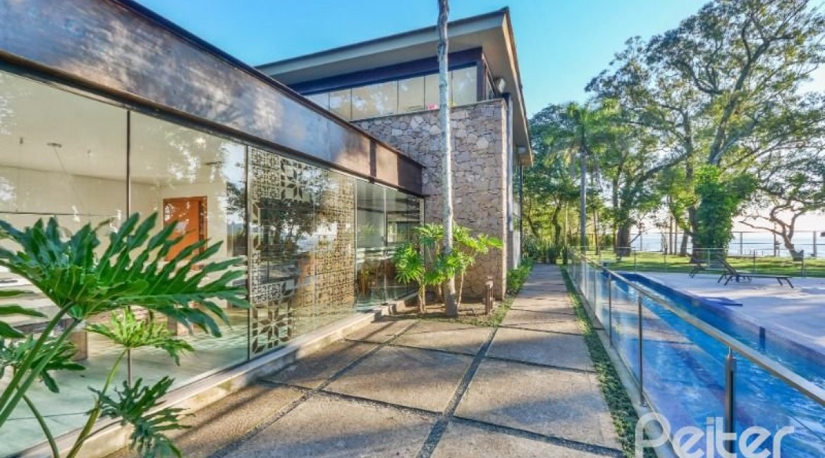 Casa em Condomínio à venda com 457m², 4 dormitórios, 4 suítes, 6 vagas, no bairro Pedra Redonda em PORTO ALEGRE