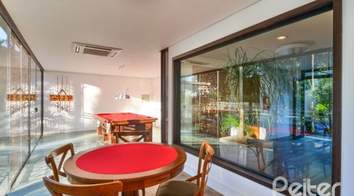 Casa em Condomínio à venda com 457m², 4 dormitórios, 4 suítes, 6 vagas, no bairro Pedra Redonda em PORTO ALEGRE
