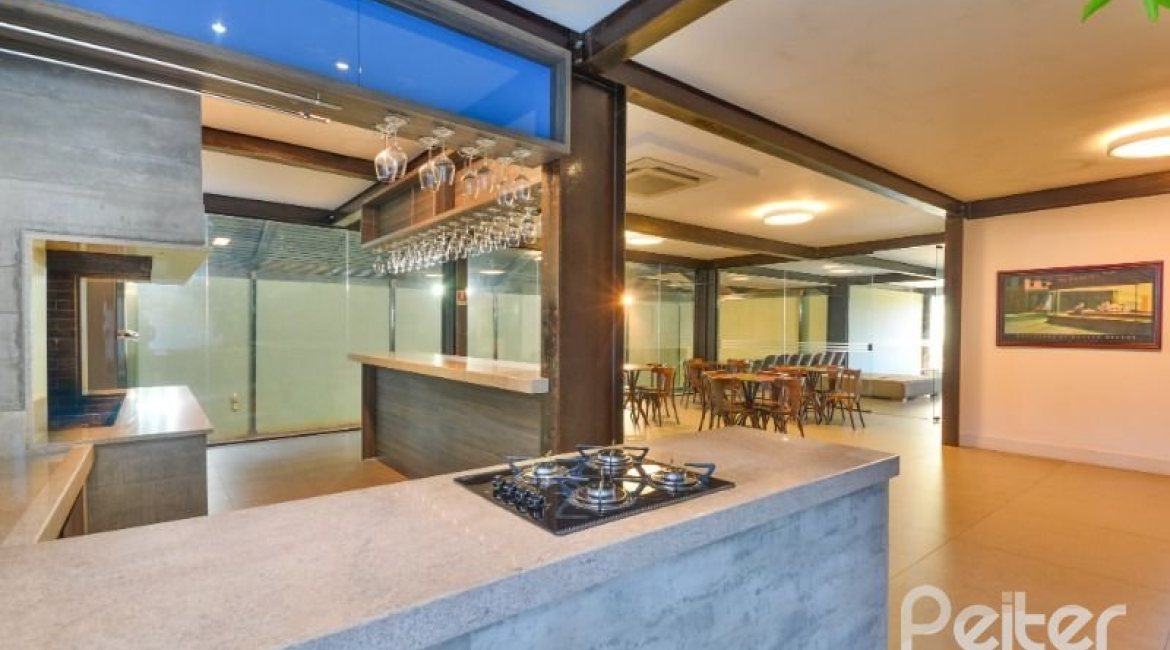 Casa em Condomínio à venda com 457m², 4 dormitórios, 4 suítes, 6 vagas, no bairro Pedra Redonda em PORTO ALEGRE