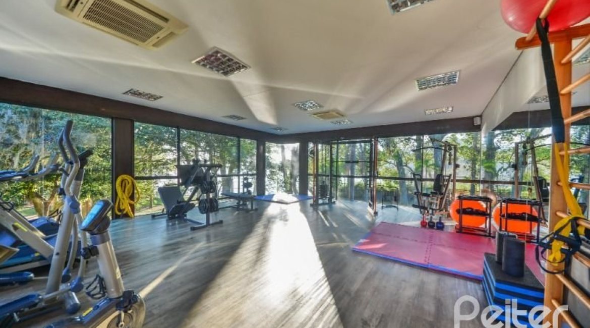 Casa em Condomínio à venda com 457m², 4 dormitórios, 4 suítes, 6 vagas, no bairro Pedra Redonda em PORTO ALEGRE