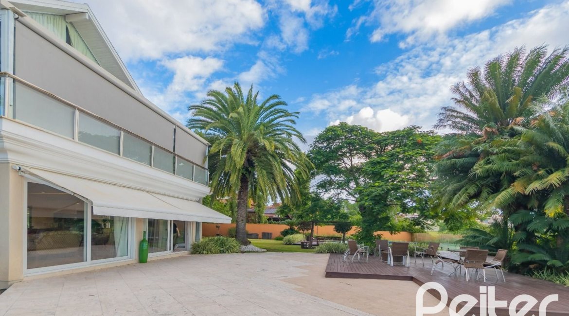 Casa em Condomínio à venda com 941m², 5 dormitórios, 5 suítes, 6 vagas, no bairro Terra Ville em PORTO ALEGRE