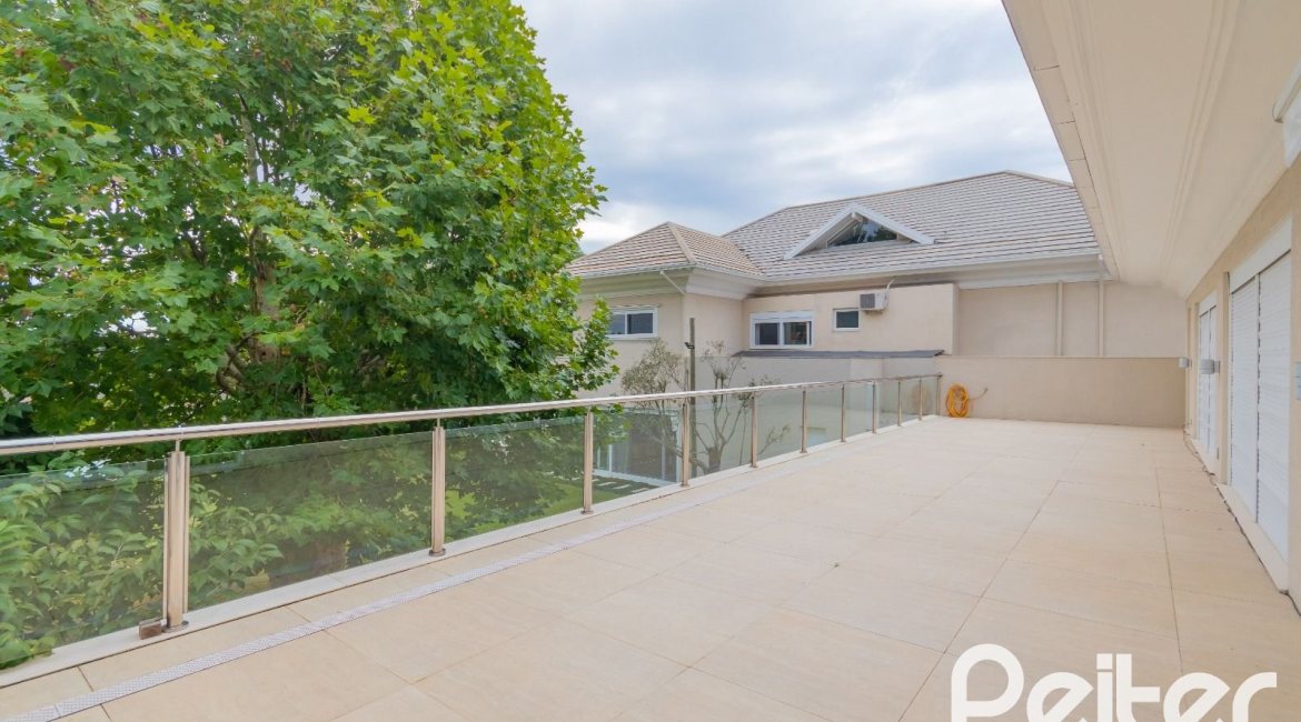 Casa em Condomínio à venda com 941m², 5 dormitórios, 5 suítes, 6 vagas, no bairro Terra Ville em PORTO ALEGRE