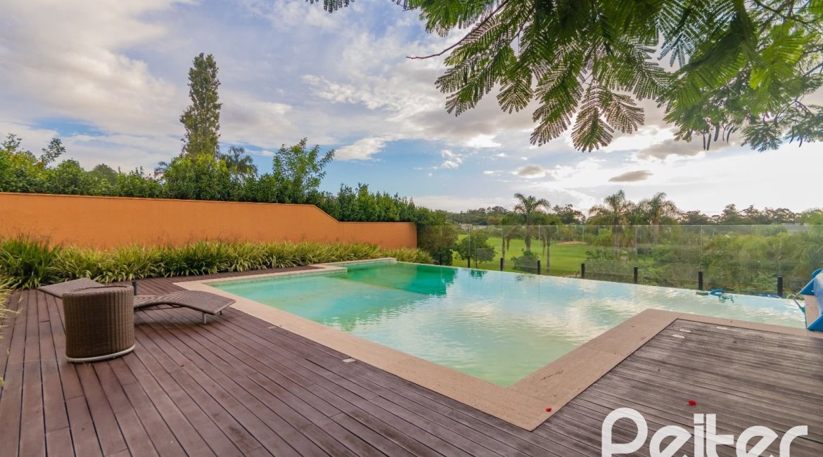 Casa em Condomínio à venda com 941m², 5 dormitórios, 5 suítes, 6 vagas, no bairro Terra Ville em PORTO ALEGRE