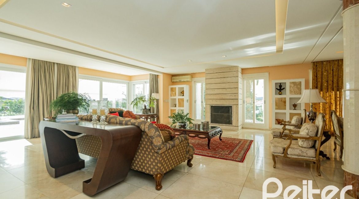 Casa em Condomínio à venda com 941m², 5 dormitórios, 5 suítes, 6 vagas, no bairro Terra Ville em PORTO ALEGRE