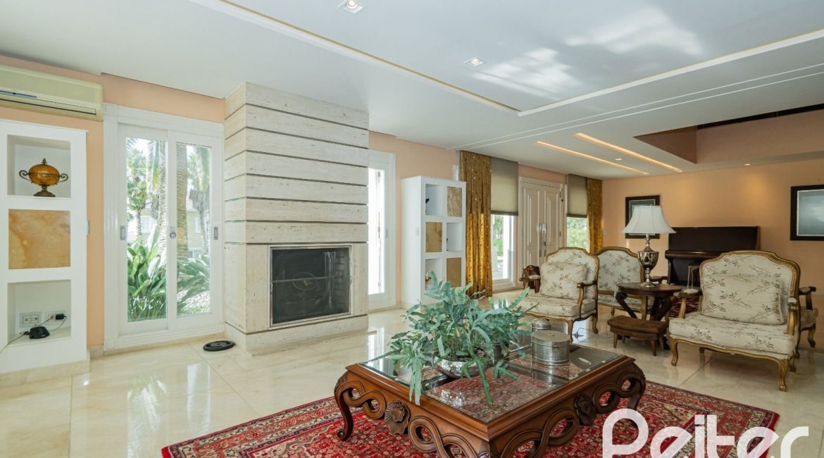 Casa em Condomínio à venda com 941m², 5 dormitórios, 5 suítes, 6 vagas, no bairro Terra Ville em PORTO ALEGRE