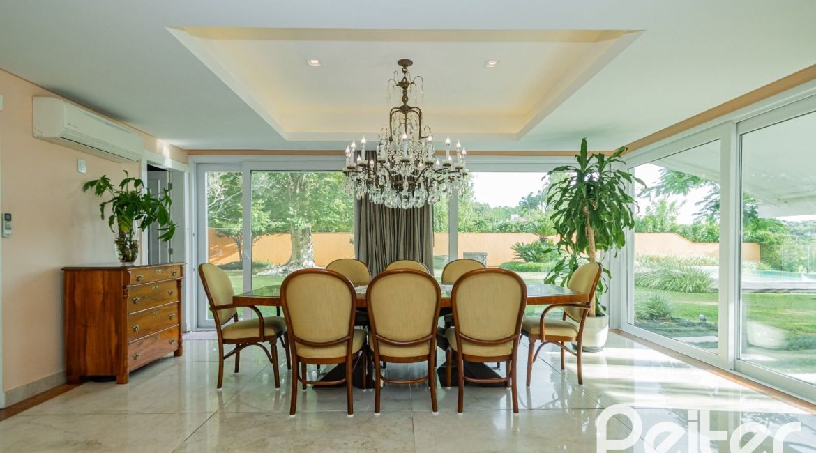 Casa em Condomínio à venda com 941m², 5 dormitórios, 5 suítes, 6 vagas, no bairro Terra Ville em PORTO ALEGRE