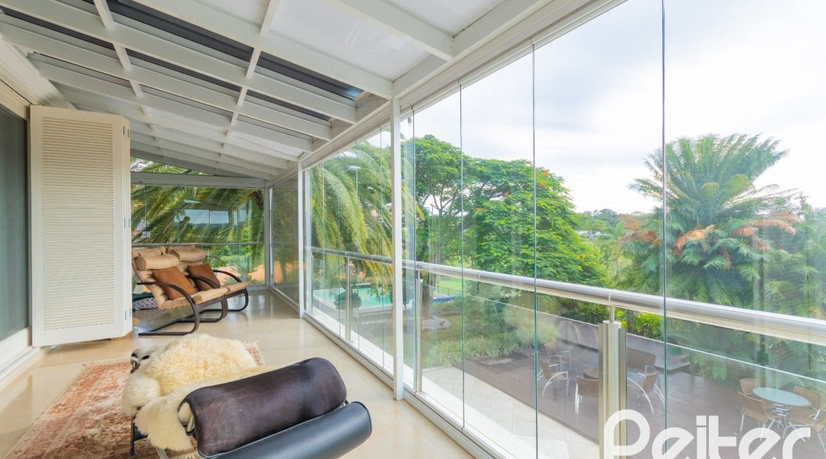 Casa em Condomínio à venda com 941m², 5 dormitórios, 5 suítes, 6 vagas, no bairro Terra Ville em PORTO ALEGRE