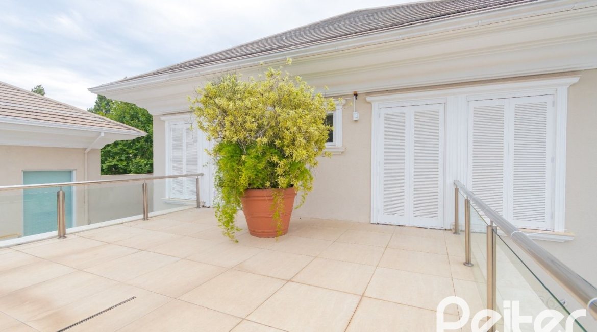 Casa em Condomínio à venda com 941m², 5 dormitórios, 5 suítes, 6 vagas, no bairro Terra Ville em PORTO ALEGRE