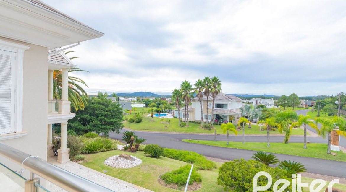 Casa em Condomínio à venda com 941m², 5 dormitórios, 5 suítes, 6 vagas, no bairro Terra Ville em PORTO ALEGRE