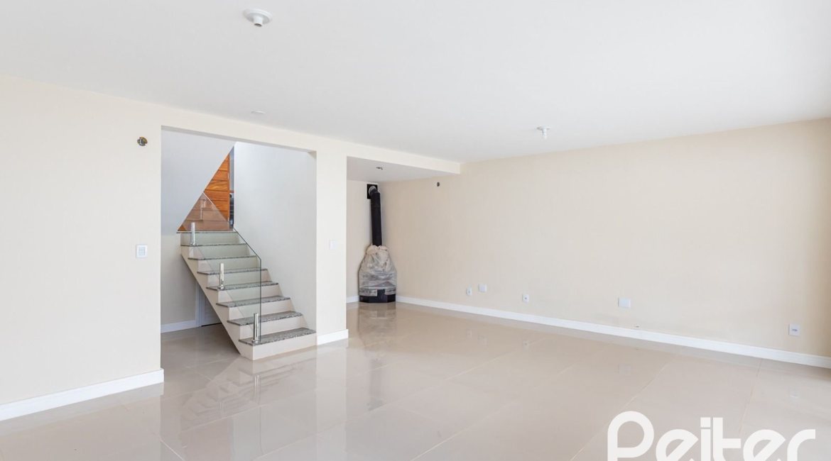 Casa em Condomínio à venda com 190m², 3 dormitórios, 1 suíte, 2 vagas, no bairro Vila Nova em PORTO ALEGRE