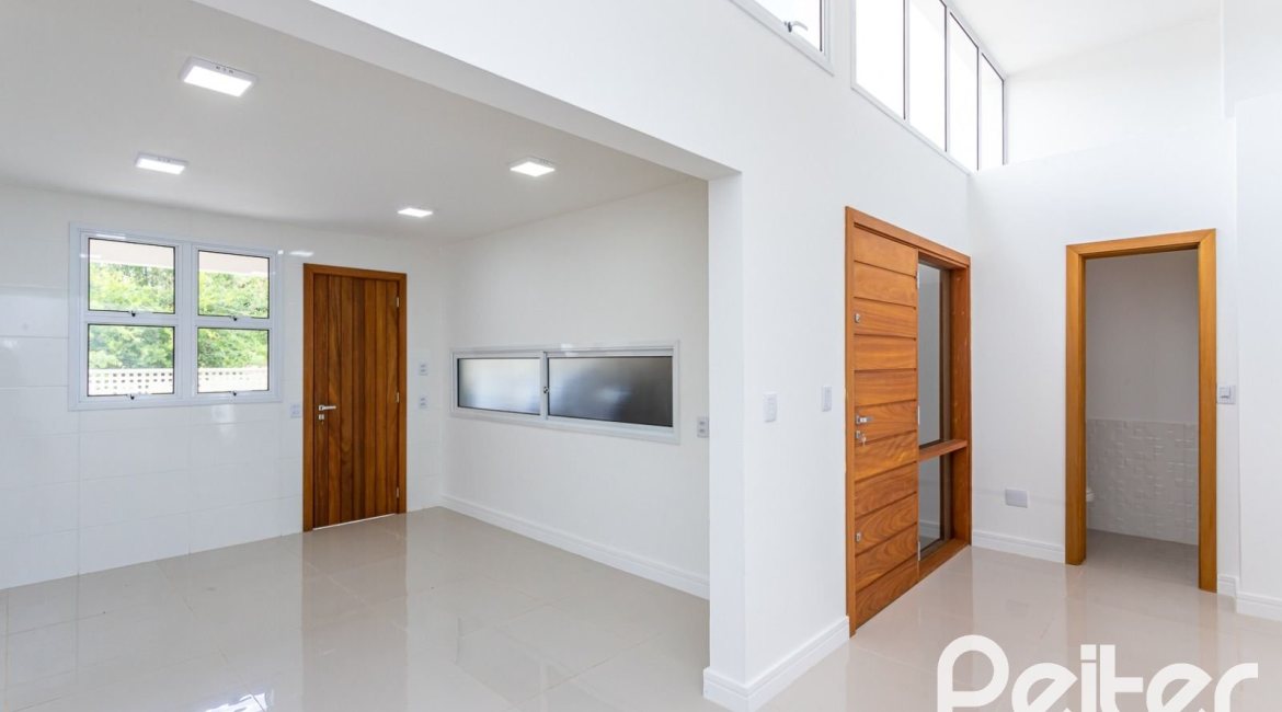 Casa em Condomínio à venda com 190m², 3 dormitórios, 1 suíte, 2 vagas, no bairro Vila Nova em PORTO ALEGRE