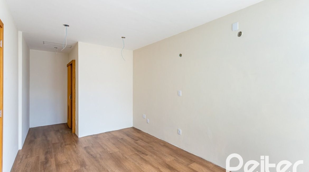 Casa em Condomínio à venda com 190m², 3 dormitórios, 1 suíte, 2 vagas, no bairro Vila Nova em PORTO ALEGRE