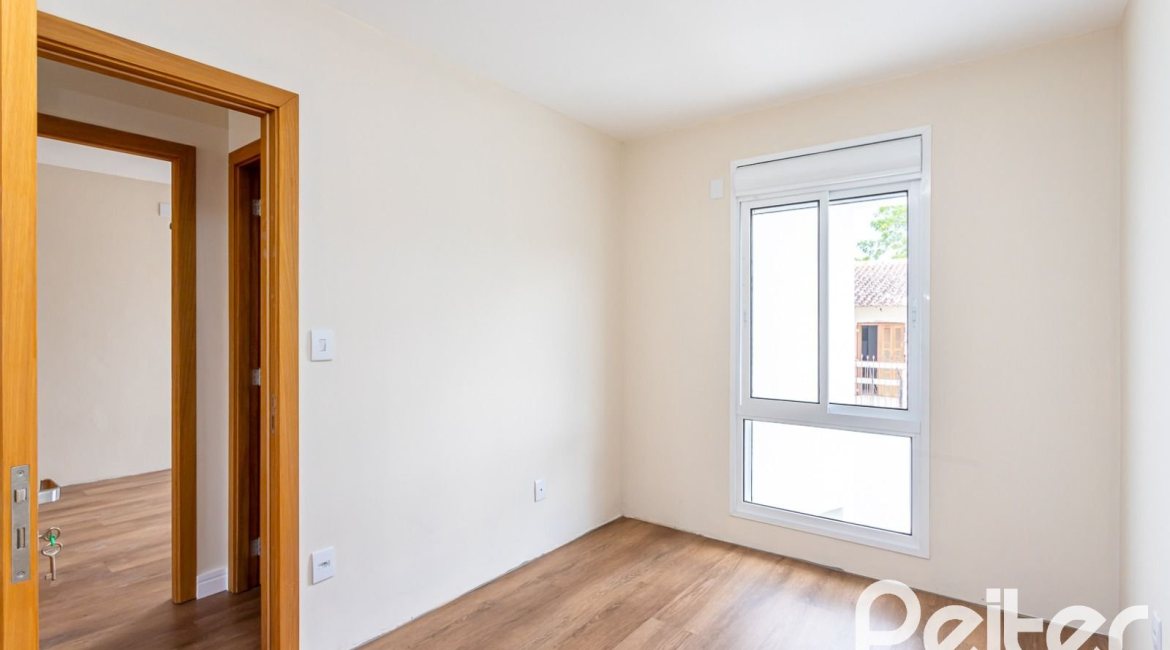 Casa em Condomínio à venda com 190m², 3 dormitórios, 1 suíte, 2 vagas, no bairro Vila Nova em PORTO ALEGRE