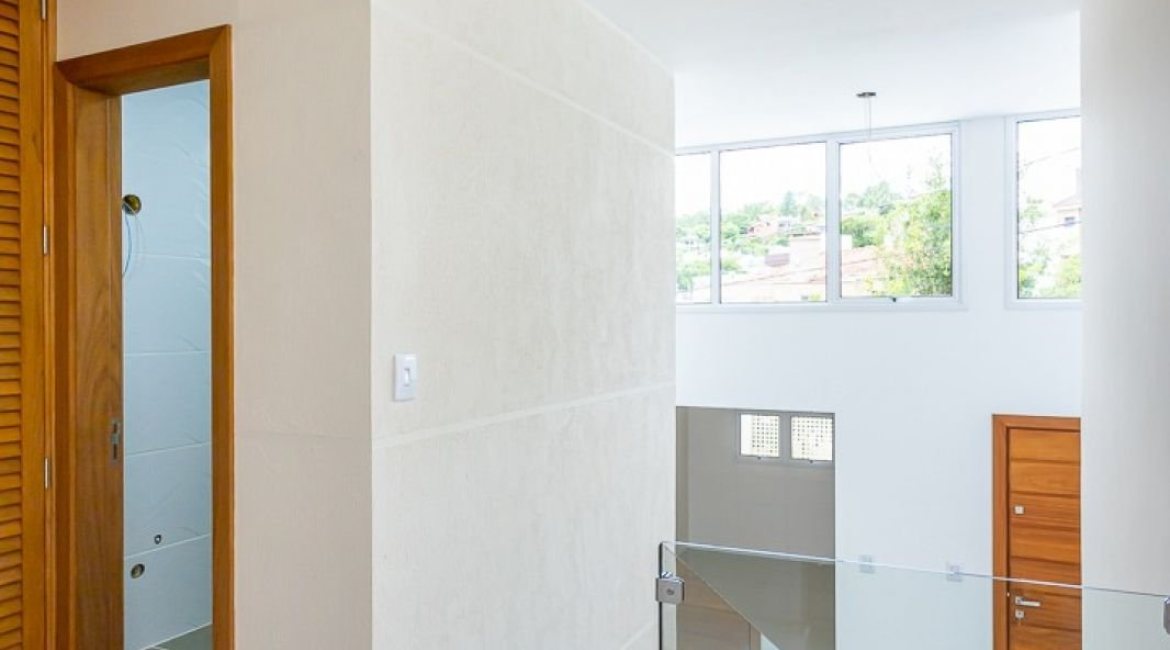 Casa em Condomínio à venda com 190m², 3 dormitórios, 1 suíte, 2 vagas, no bairro Vila Nova em PORTO ALEGRE