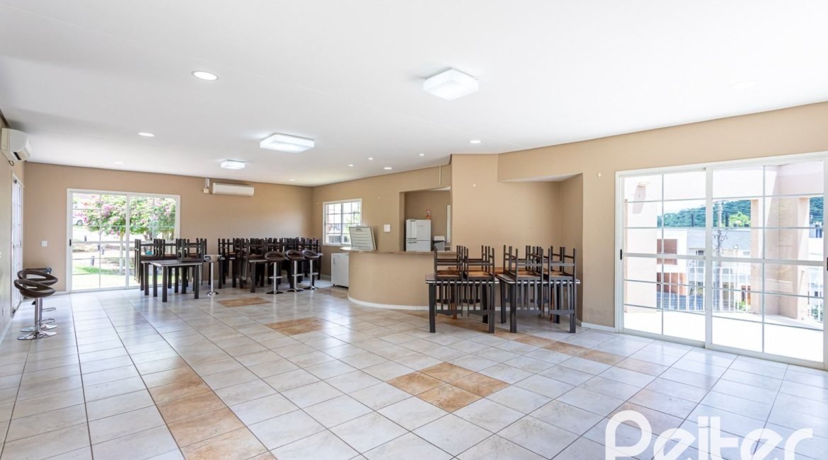 Casa em Condomínio à venda com 190m², 3 dormitórios, 1 suíte, 2 vagas, no bairro Vila Nova em PORTO ALEGRE