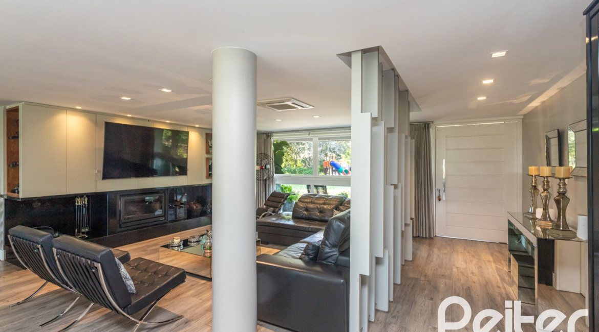 Casa em Condomínio à venda com 478m², 4 dormitórios, 4 suítes, 4 vagas, no bairro Terra Ville em PORTO ALEGRE