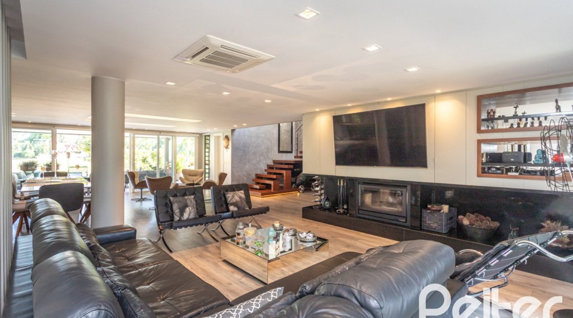 Casa em Condomínio à venda com 478m², 4 dormitórios, 4 suítes, 4 vagas, no bairro Terra Ville em PORTO ALEGRE