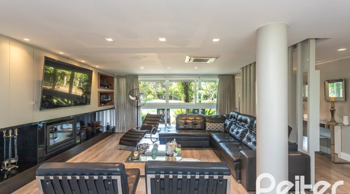 Casa em Condomínio à venda com 478m², 4 dormitórios, 4 suítes, 4 vagas, no bairro Terra Ville em PORTO ALEGRE