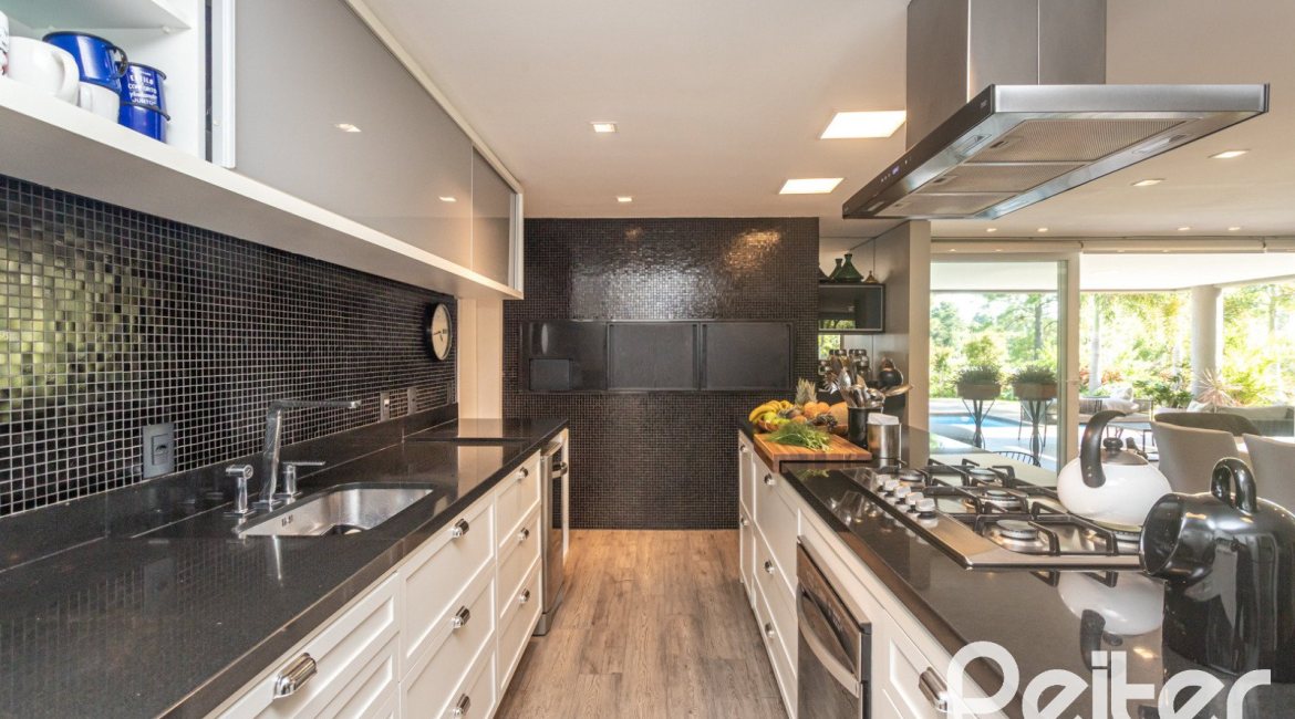 Casa em Condomínio à venda com 478m², 4 dormitórios, 4 suítes, 4 vagas, no bairro Terra Ville em PORTO ALEGRE