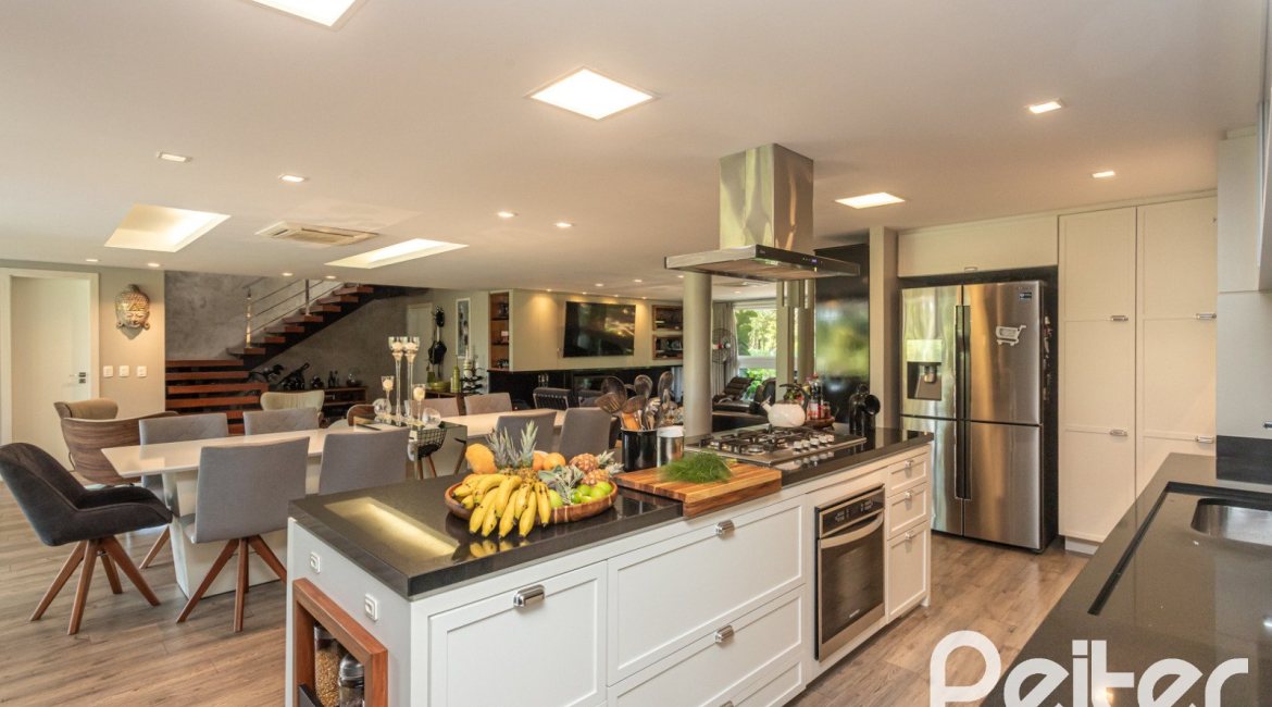 Casa em Condomínio à venda com 478m², 4 dormitórios, 4 suítes, 4 vagas, no bairro Terra Ville em PORTO ALEGRE